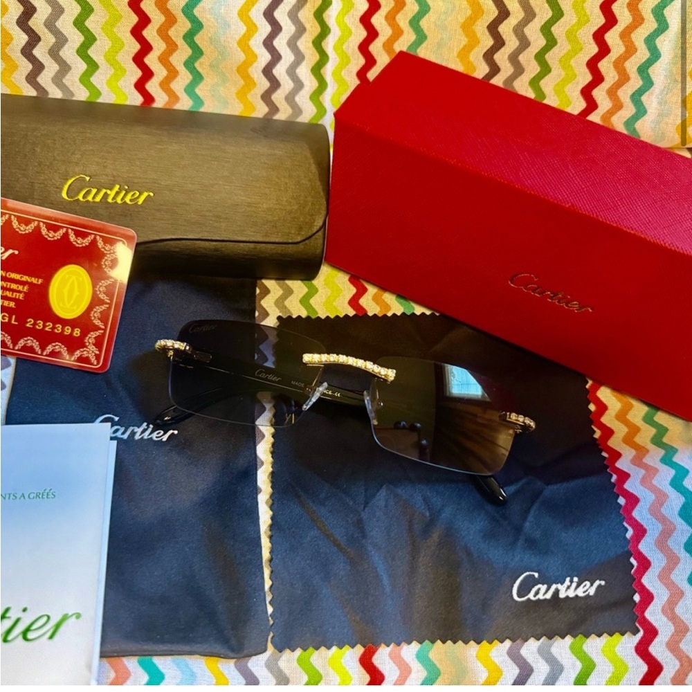 Cartier Black Sunglasses with Gold and Diamond accents